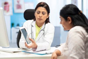 Indian, Doctor, Young woman, doctor clinic, Female Doctor, talking