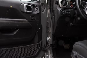 Detailed interior shot of a car showing the door panel and part of the dashboard. — California Dreaming: How a Digital Market