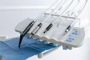 Close-up of dental equipment with handpieces, showcasing modern dental care tools in a clinic. — Dental Implant Guide