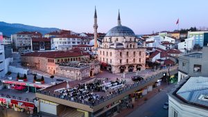 Aerial shot of Bolu city with a prominent mosque and bustling streets during twilight. — Innovation in Health: Paving the Way