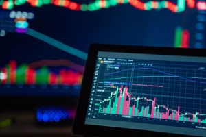 Colorful trading charts showing cryptocurrency market trends on a computer screen. — MetaTrader 4 Delivers Robust Features fo