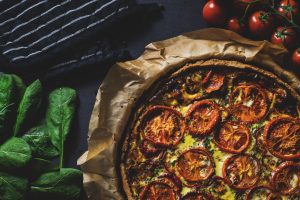 Delicious rustic quiche topped with tomatoes, ideal for a healthy and tasty meal. — Microwaved Foods - Healthy or Harmful?