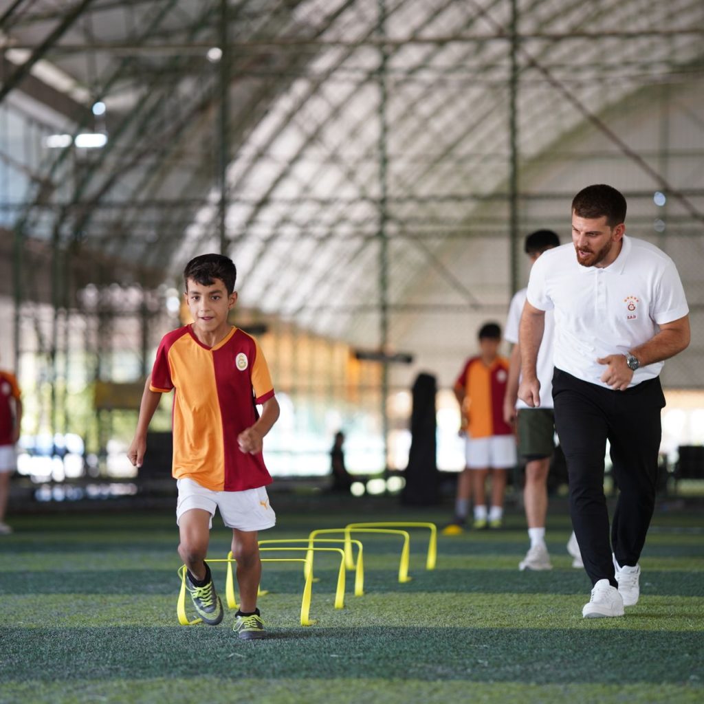 Energetic indoor soccer training with kids and coach, focusing on agility and teamwork. — Part-Time Excellence: Fox's Job Opp