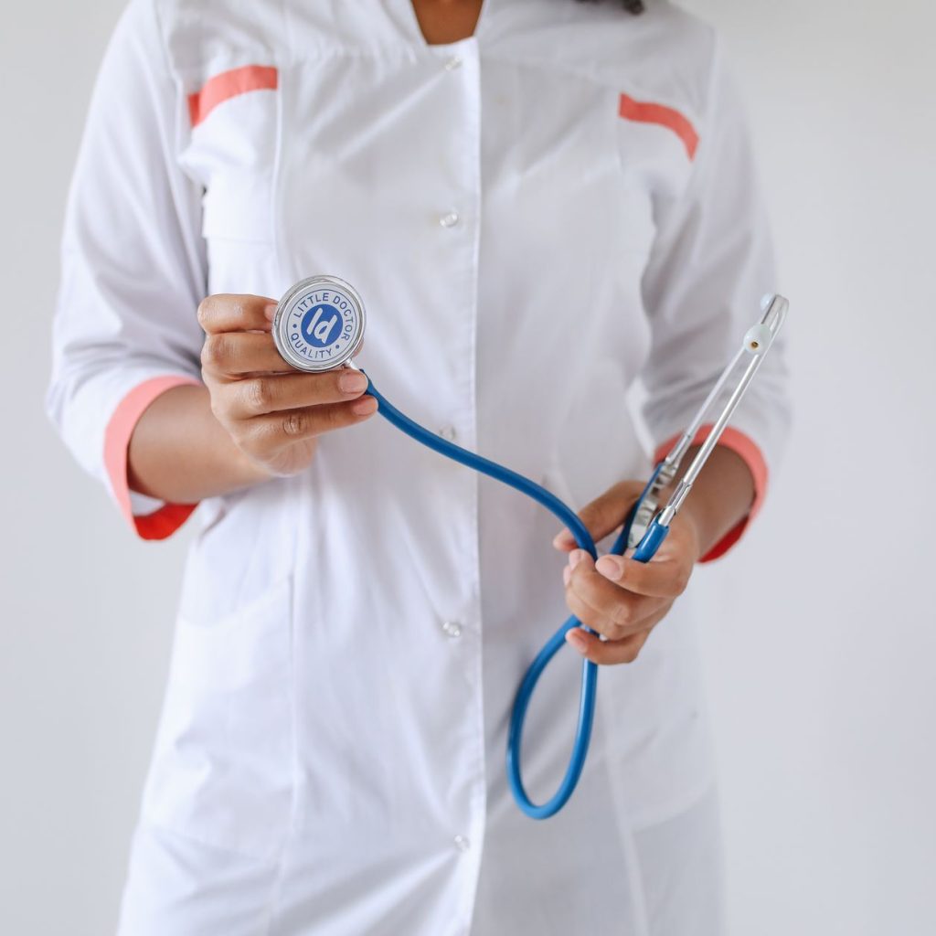 Close-up of a female doctor holding a blue stethoscope, emphasizing healthcare and professionalism. — The Significance of 420