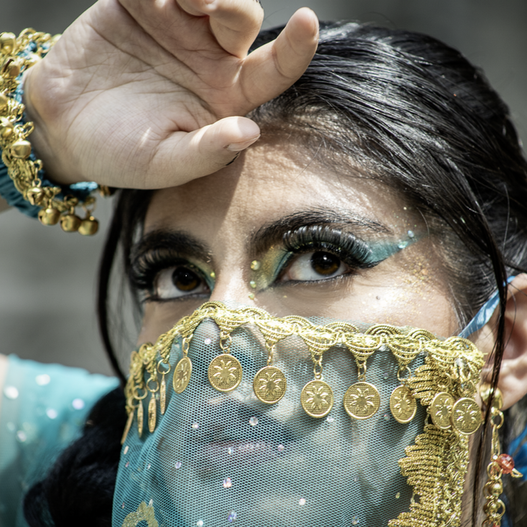Close-up of an elegantly adorned woman in traditional attire with gold details. — Top 4 Reasons Consumers Are Turning to Natu