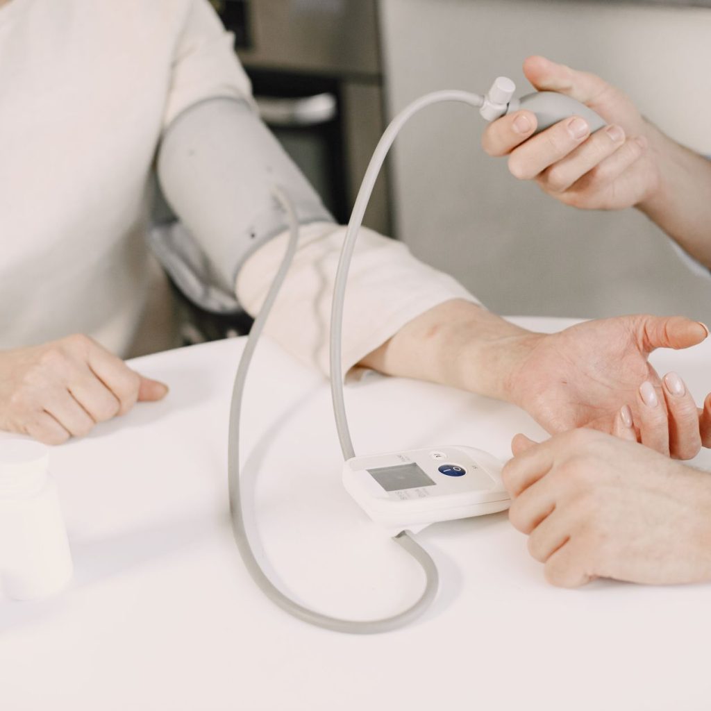 Close-up of blood pressure measurement at home highlighting healthcare equipment. — Understand How Treatment at That Center W