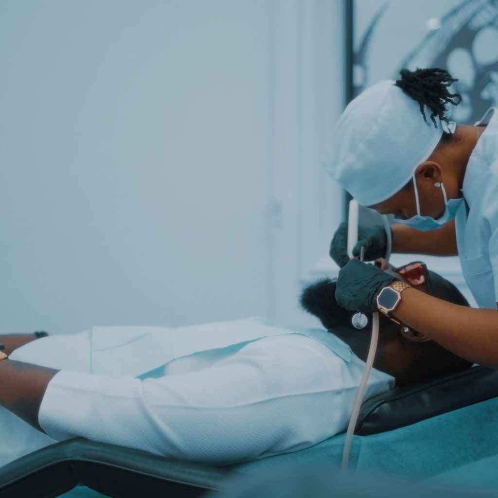 A dental professional performs a procedure on a patient in a Lagos clinic. — What is the use of peptides in the Functionality