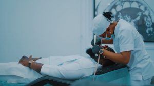 A dental professional performs a procedure on a patient in a Lagos clinic. — What is the use of peptides in the Functionality